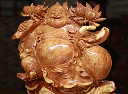 Phật di lặc kéo bao tiền gỗ nu hương đá Gia Lai